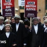 Barristers walk out of courts in strike over legal aid funding