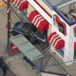 Car crashes into KFC in Queens during attempted carjacking, suspect arrested